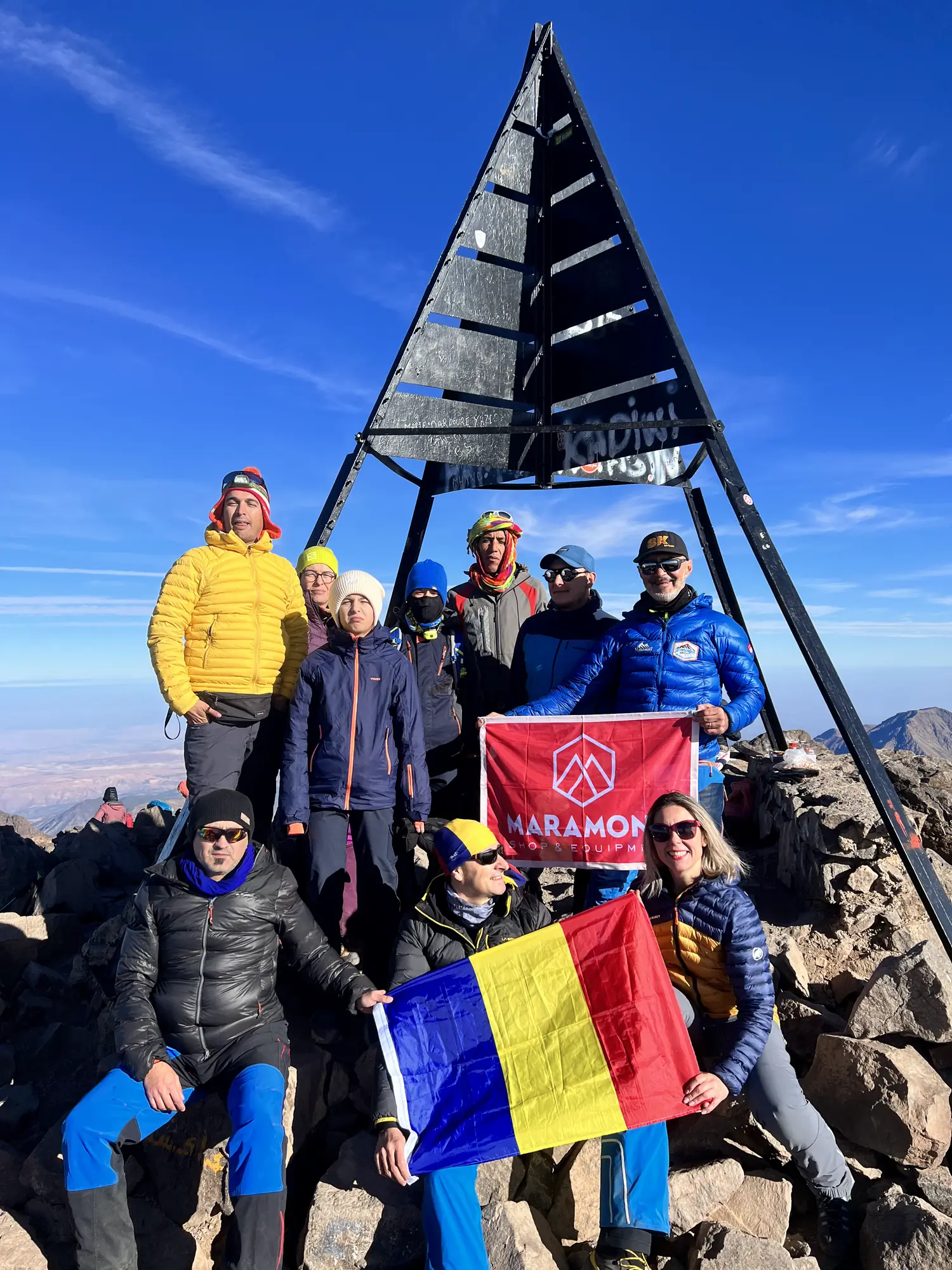 Trekkers crossing a high pass in the Atlas